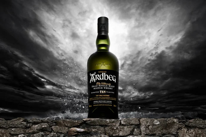 Ardbeg Islay Single Malt Scotch Whisky bottle with peat smoke background